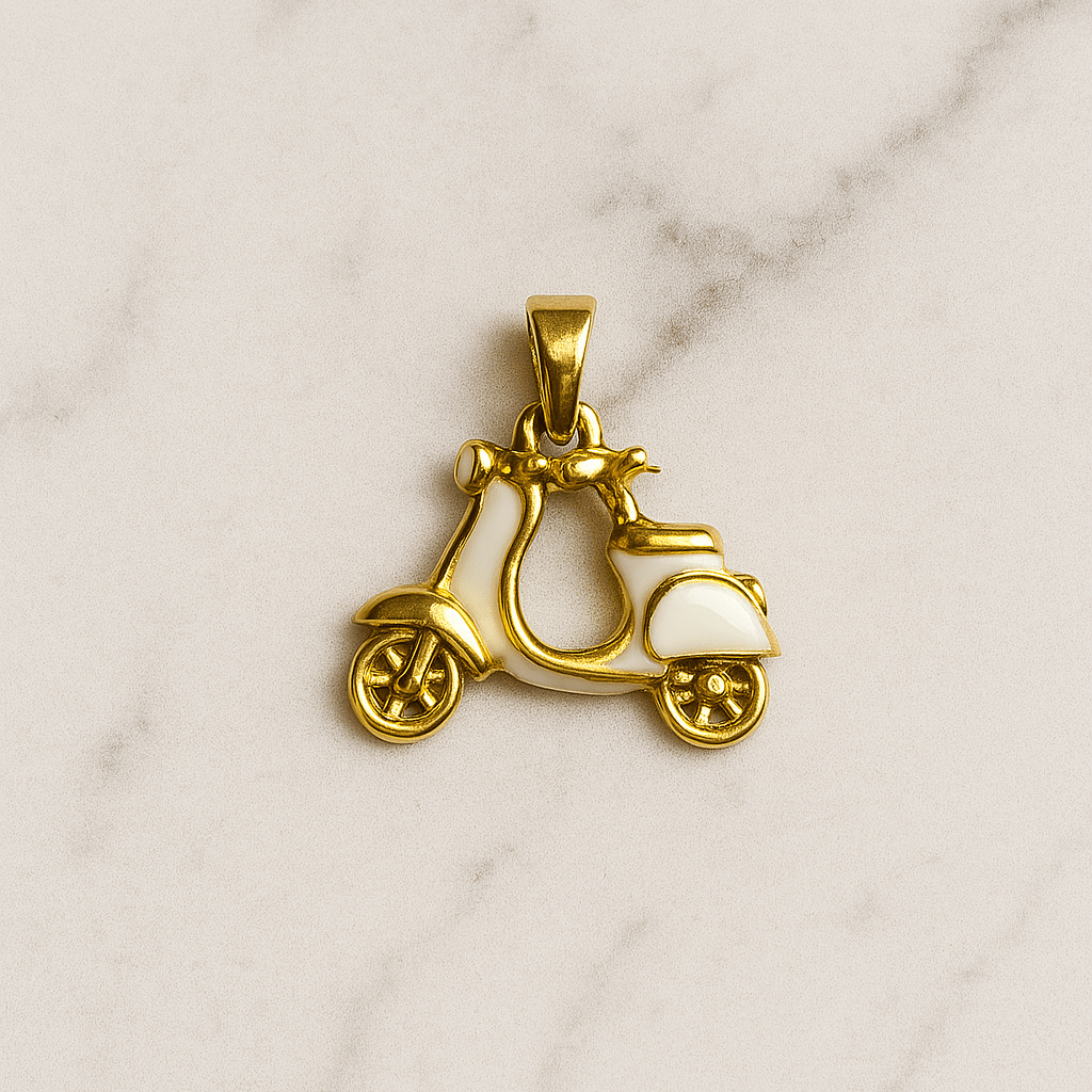 Gold scooter pendant on a marble background