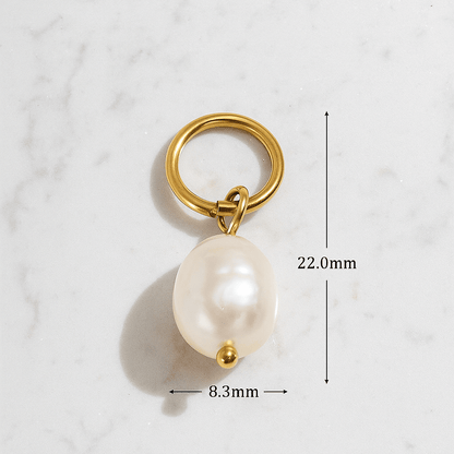 Gold ring with a pearl on a white background, showing measurements and material details.