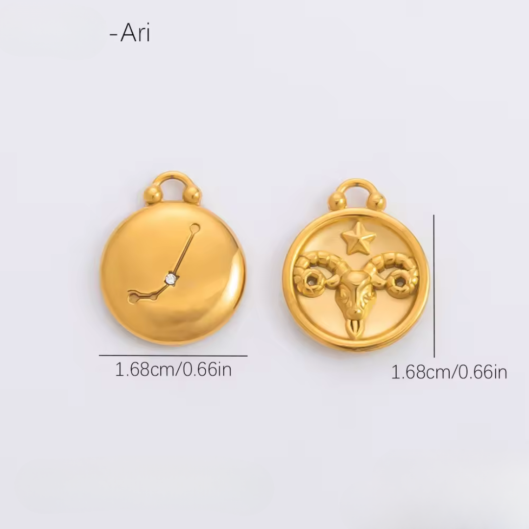 Two gold pendants with measurements on a light gray background