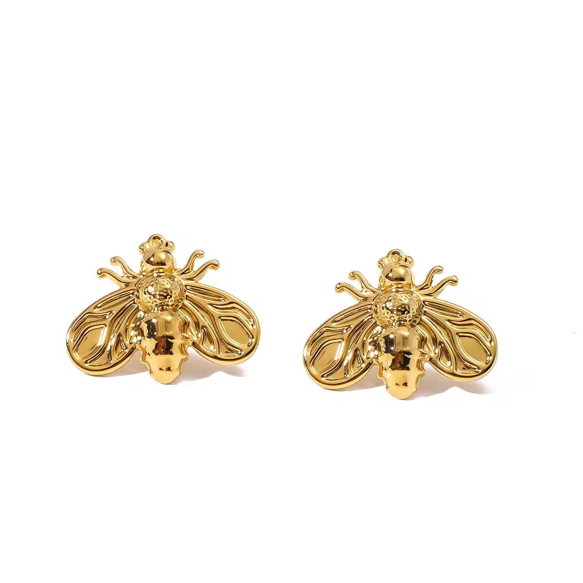 A pair of gold-colored earrings designed in the shape of bees with glossy wings.