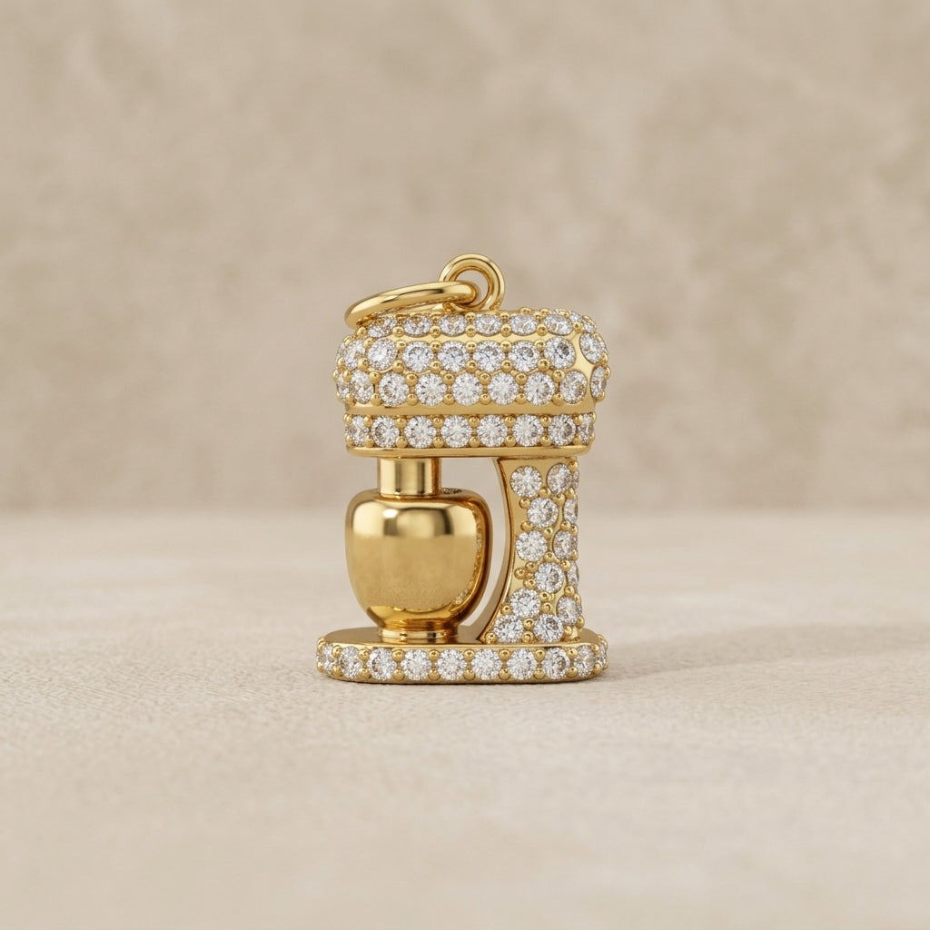 Gold and diamond charm on a beige background