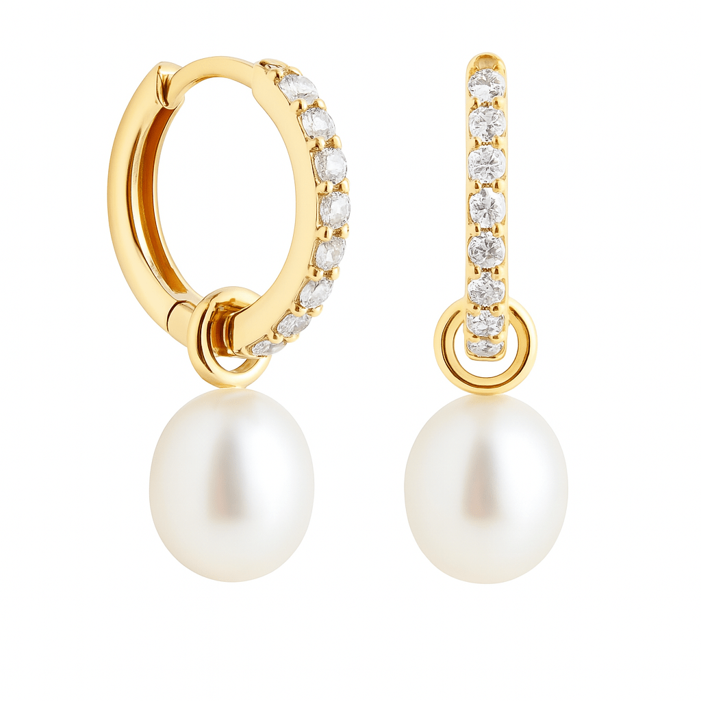 Gold hoop earrings with pearl drops on a white background