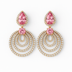 Pair of earrings with pink gemstones and gold and diamond accents on a white background