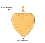 Gold heart-shaped pendant with measurements on a white background