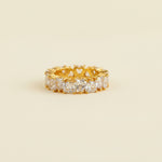 Pair of diamond earrings on a light gray background