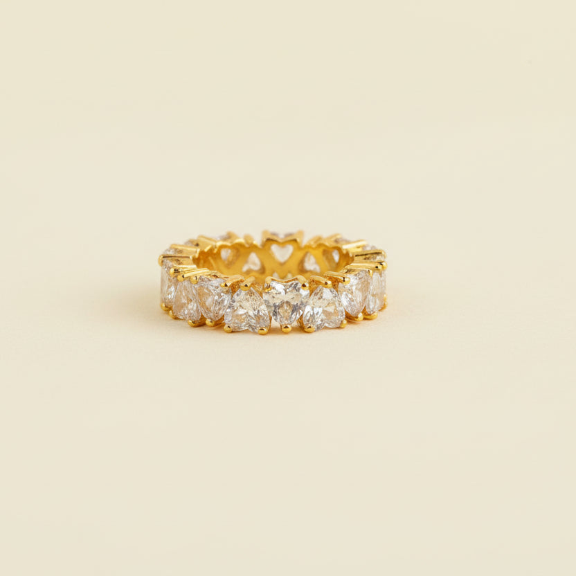 Pair of diamond earrings on a light gray background