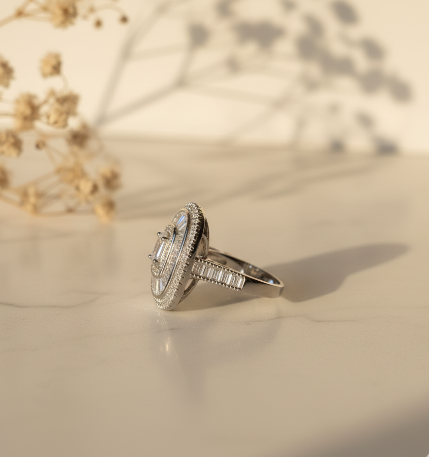 Silver ring with gemstones on a light background