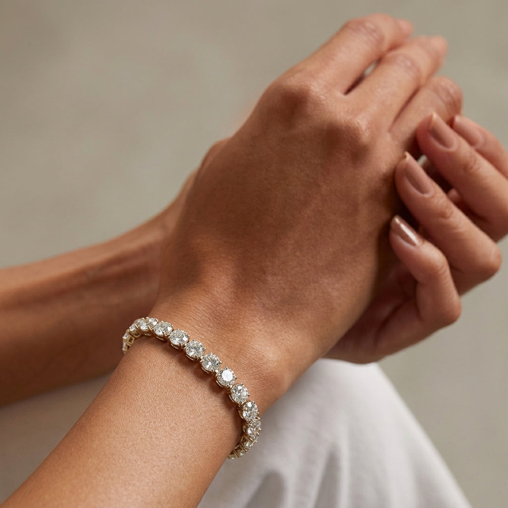 Close-up of a hand wearing a bracelet with a neutral background