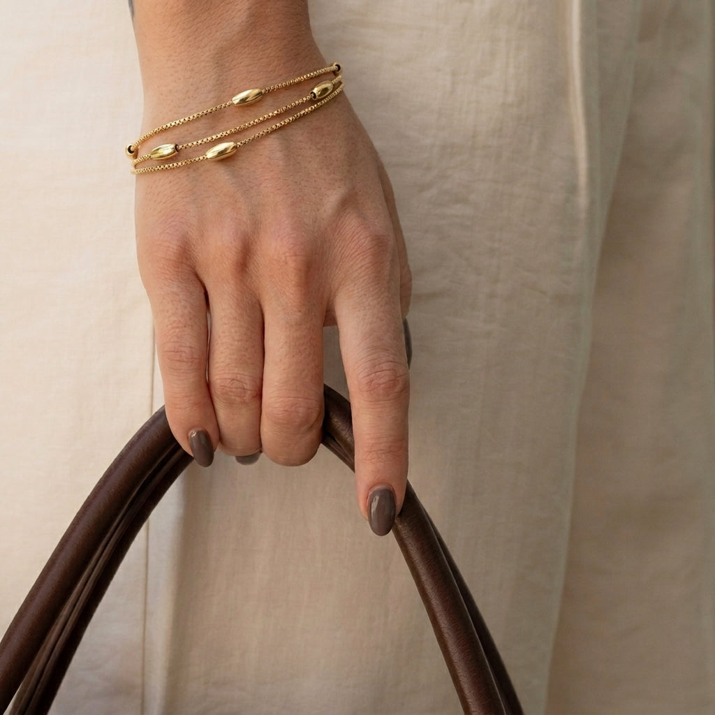 3 layered box chain bracelet with oval beads