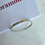 Silver bracelet on a white box with 'Foramour' branding.