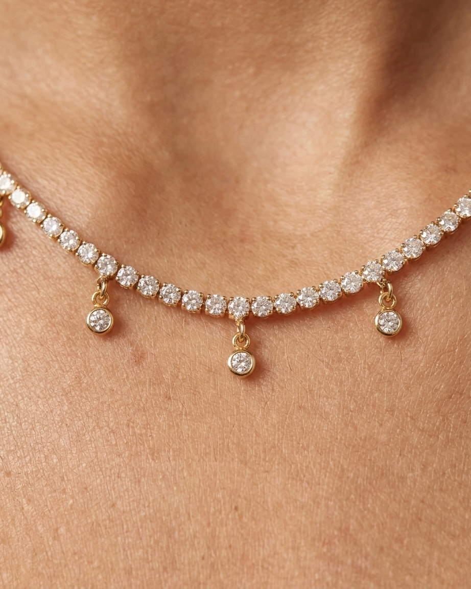 Rose gold necklace with diamonds on a person's neck