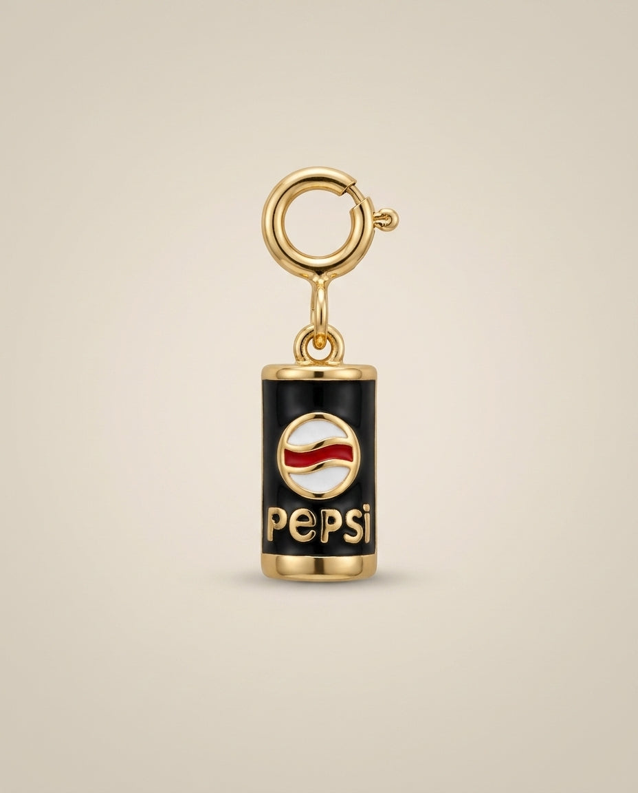Pepsi charm with gold accents on a beige background